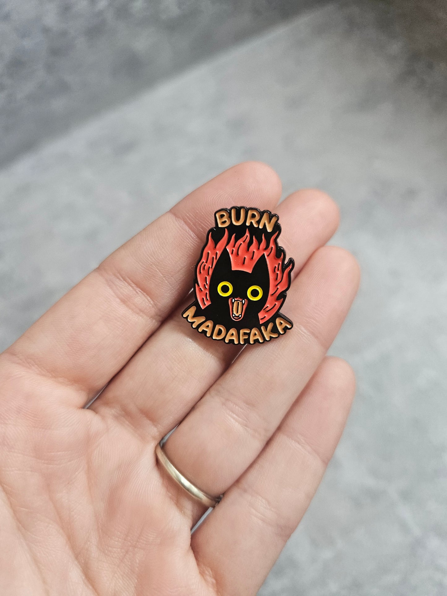 Burn muda Pin Badge