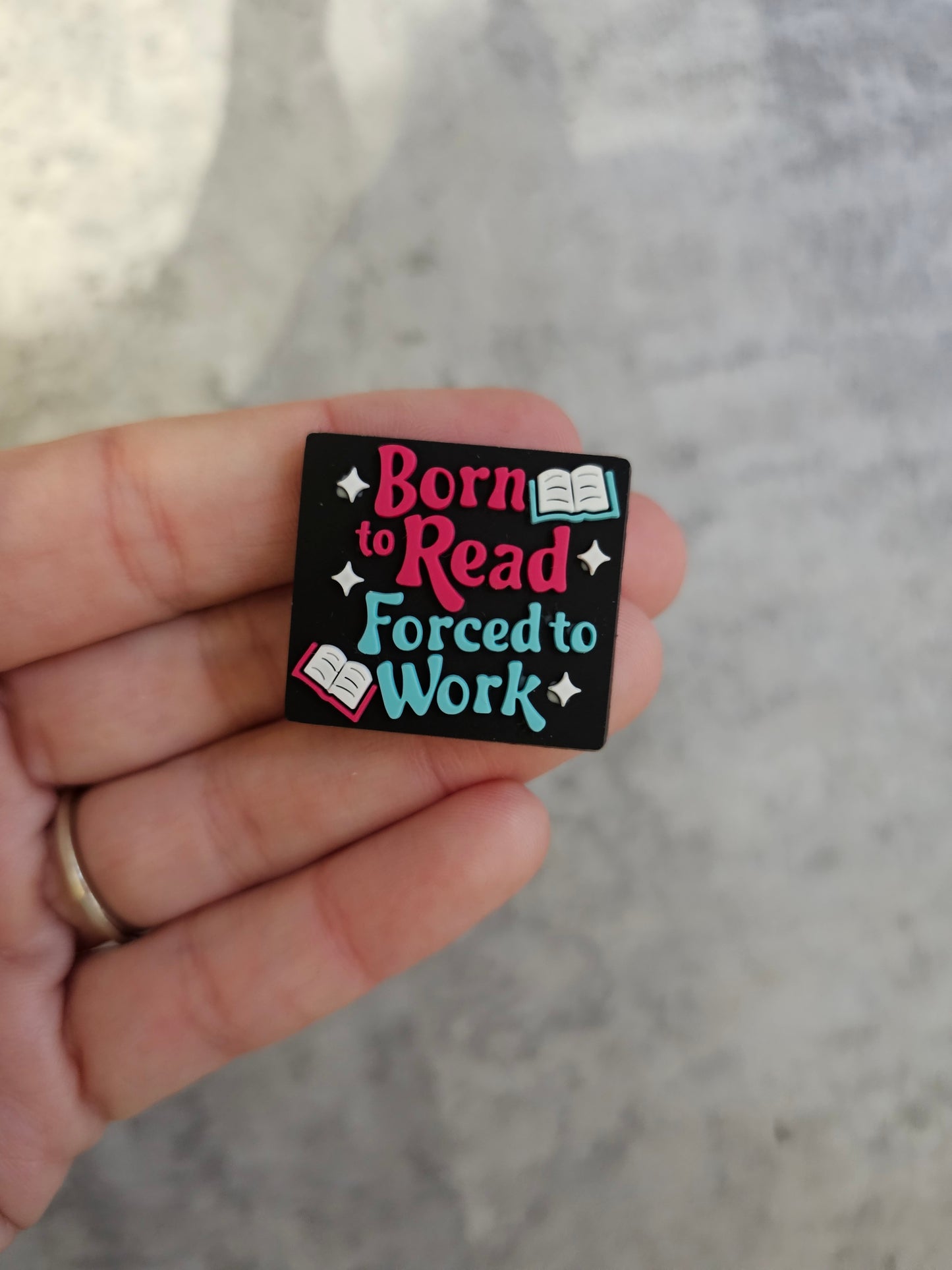 Born to read, forced to work, shoe charm