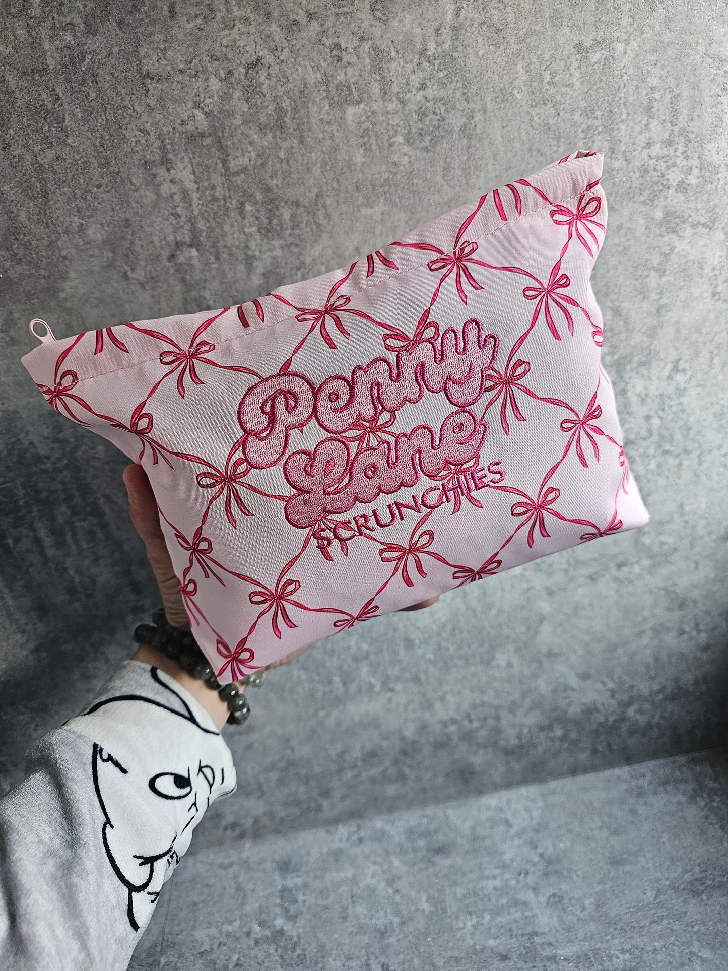 Embroidered zip pouches