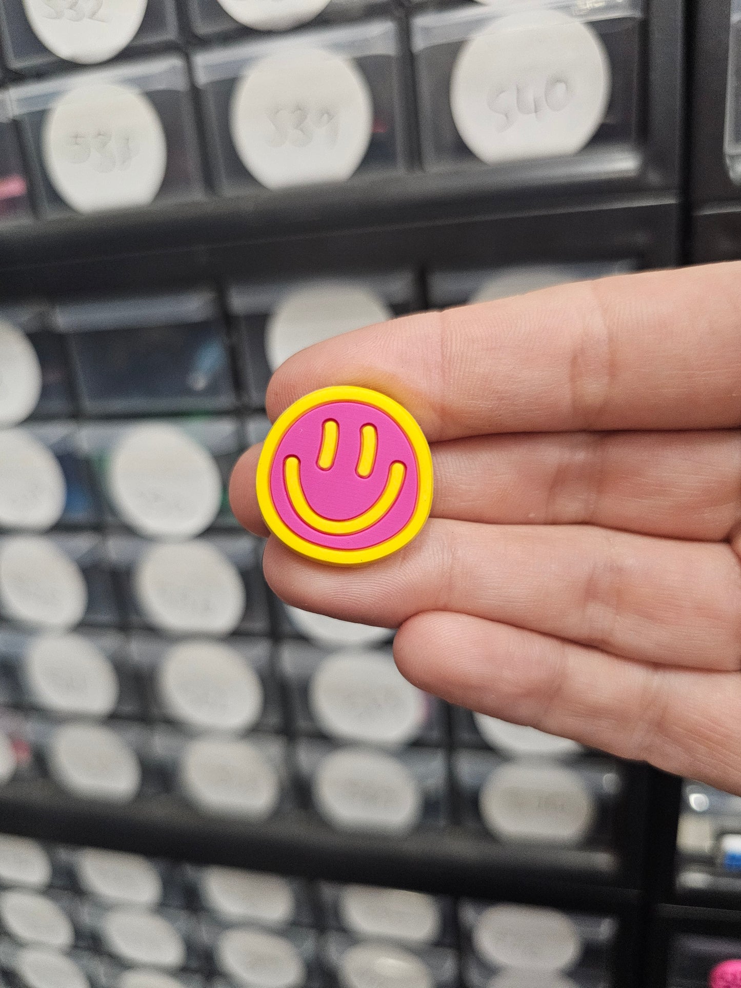 Pink with yellow smiley shoe charm