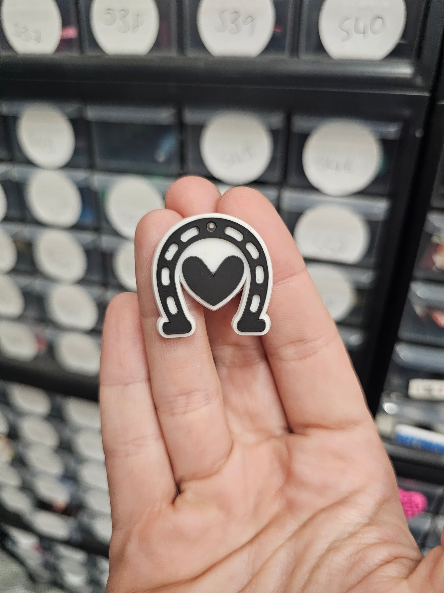 Horse shoe with heart shoe charm
