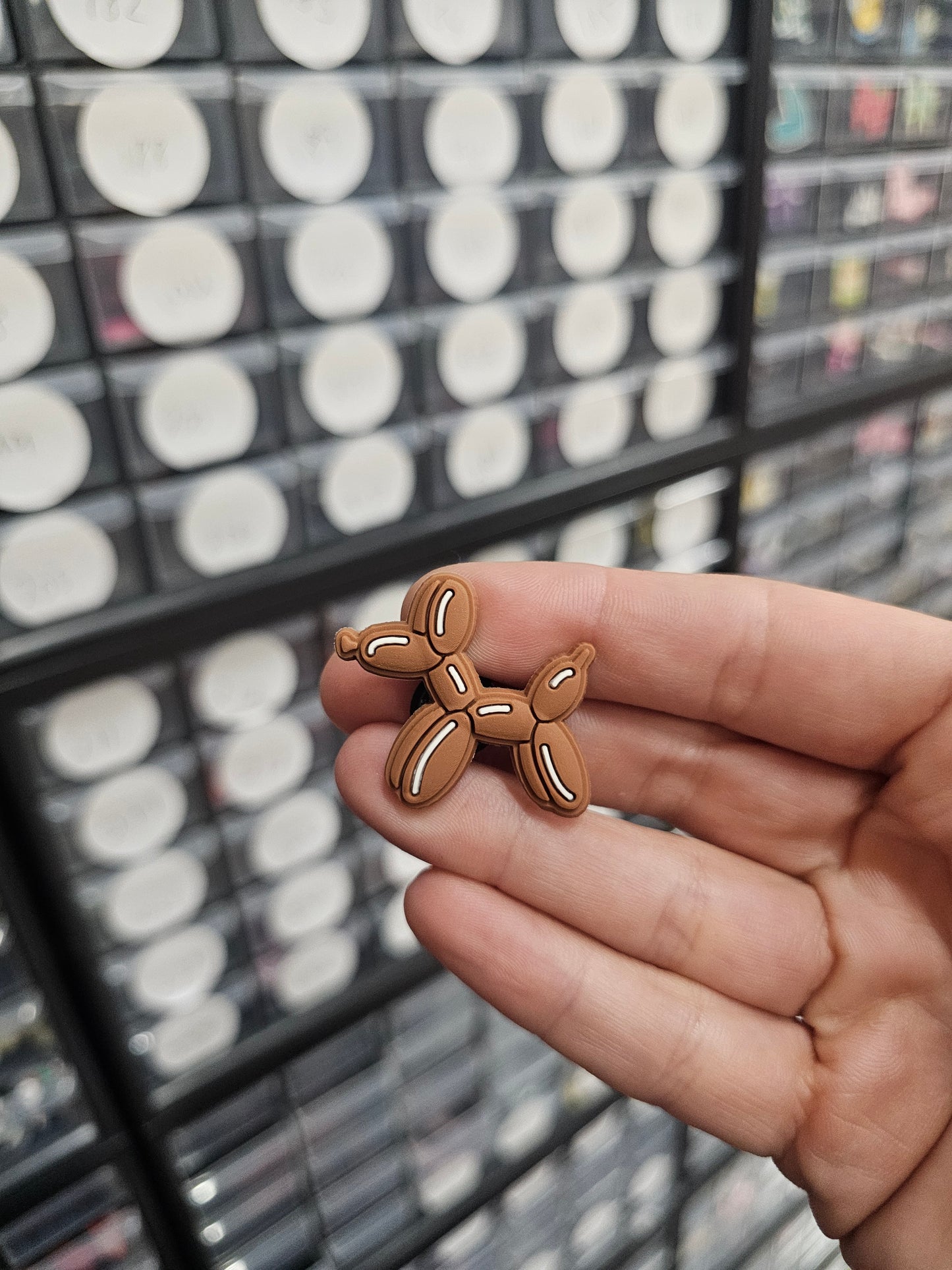 Brown balloon dog shoe charm
