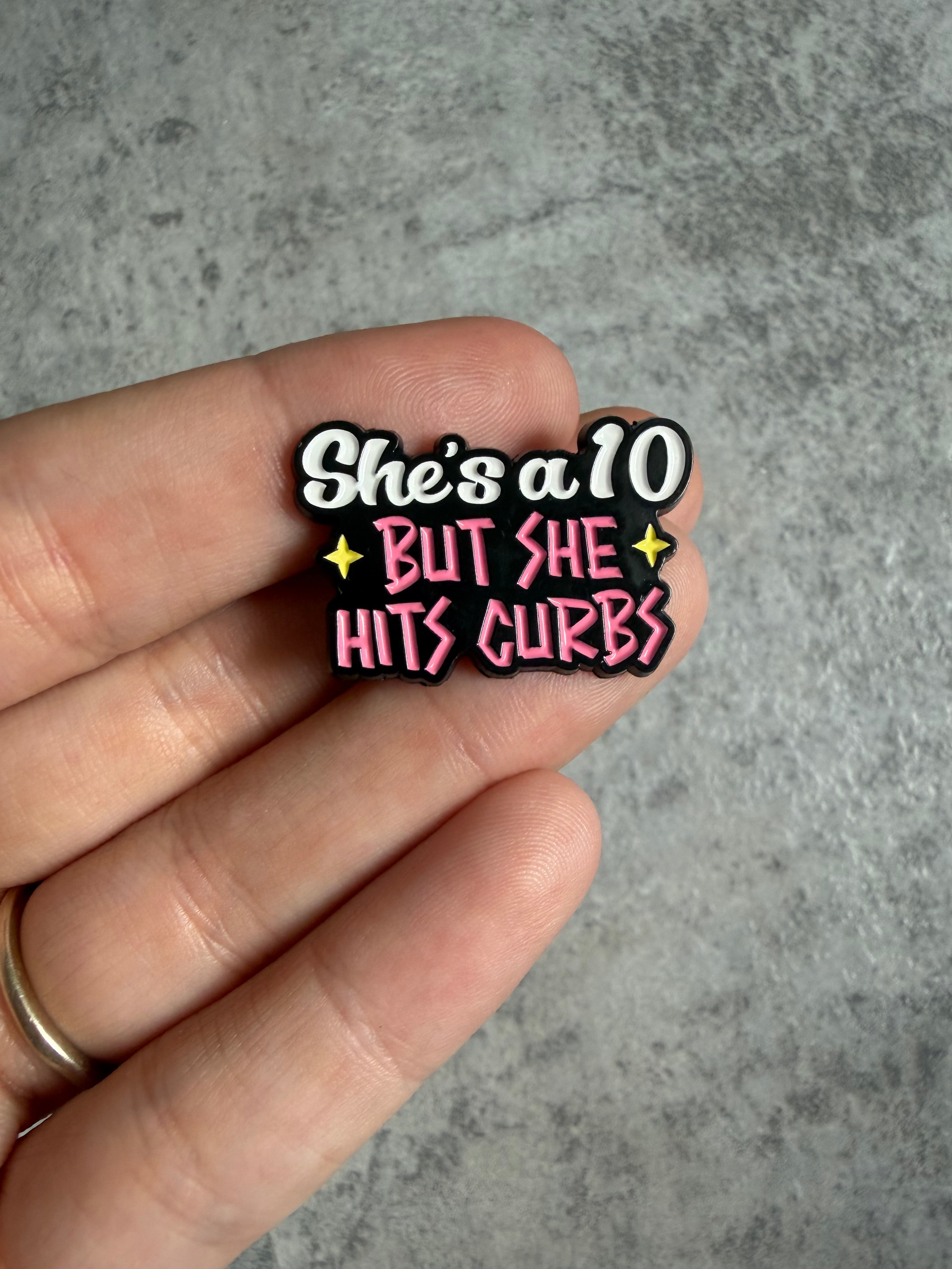 She’s a 10 but she hits curbs Pin Badge