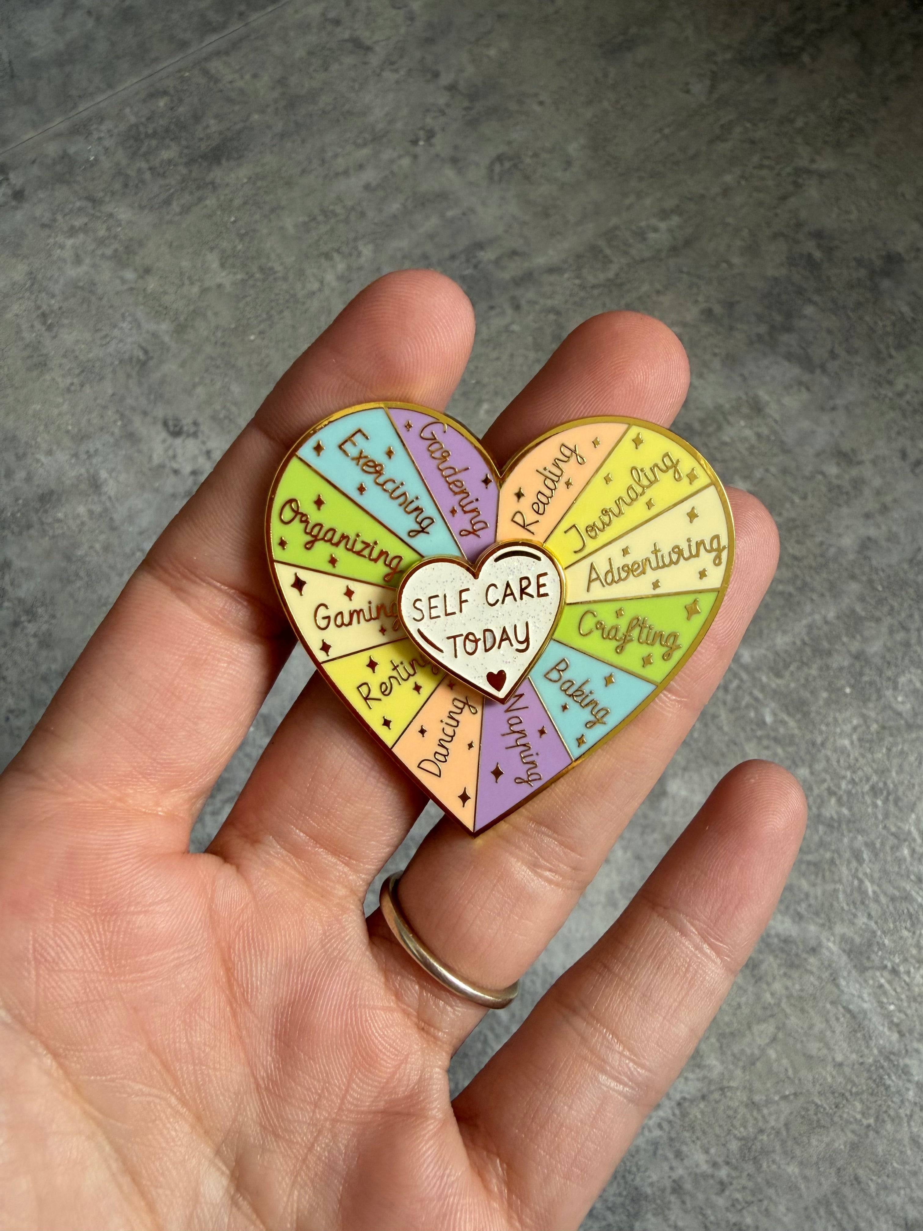 Self care spinning heart Pin Badge