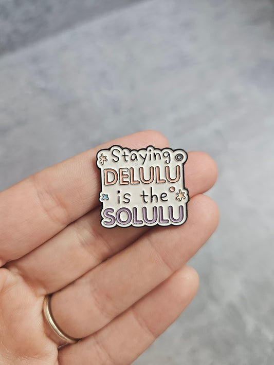 Staying delulu is the solulu Pin Badge