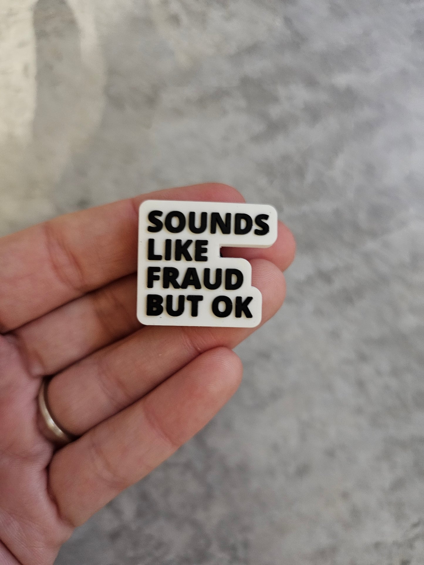 Sounds like fraud but ok, shoe charm