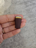 Brown beer glass, shoe charm