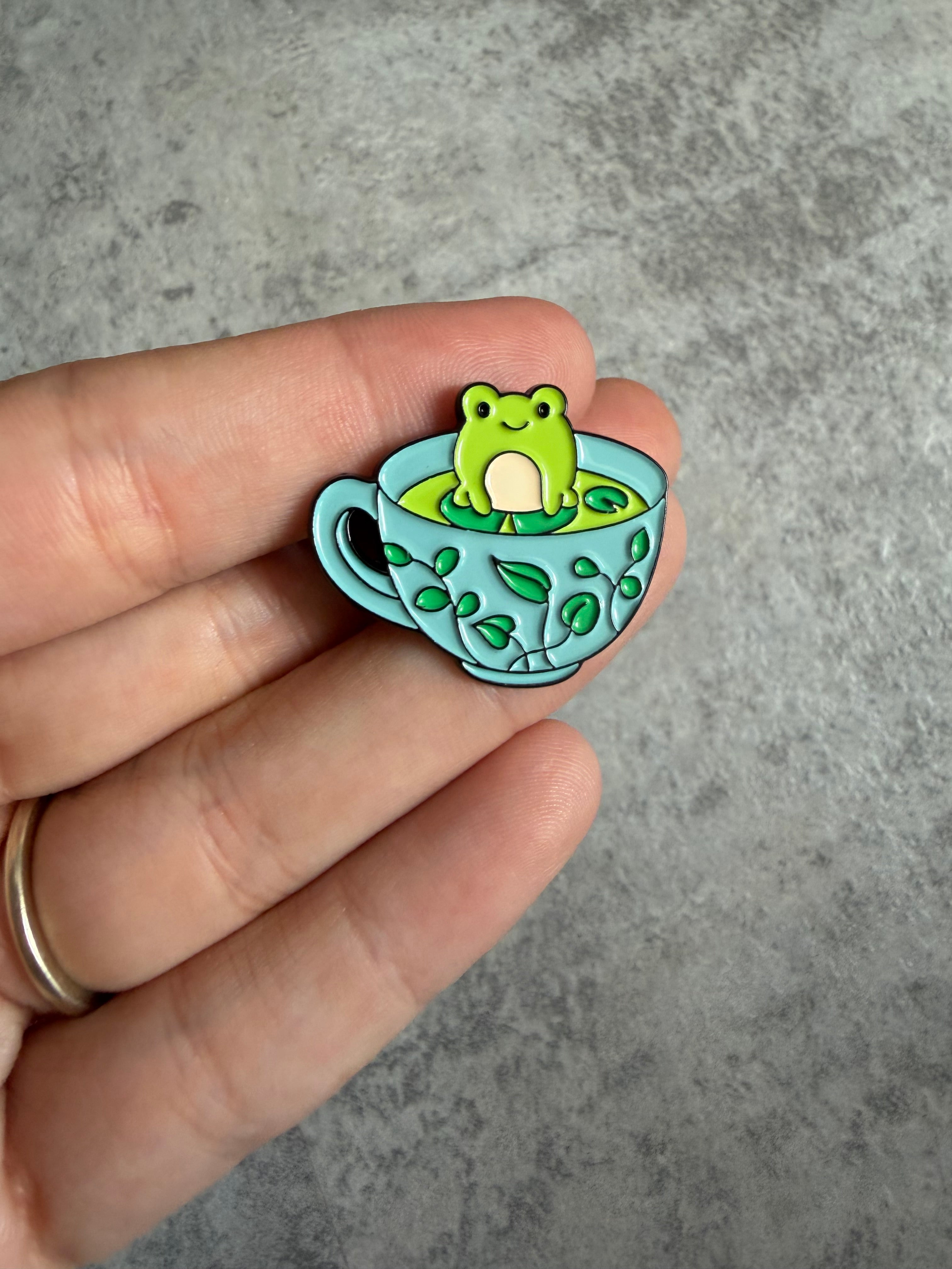 Frog in blue cup Pin Badge