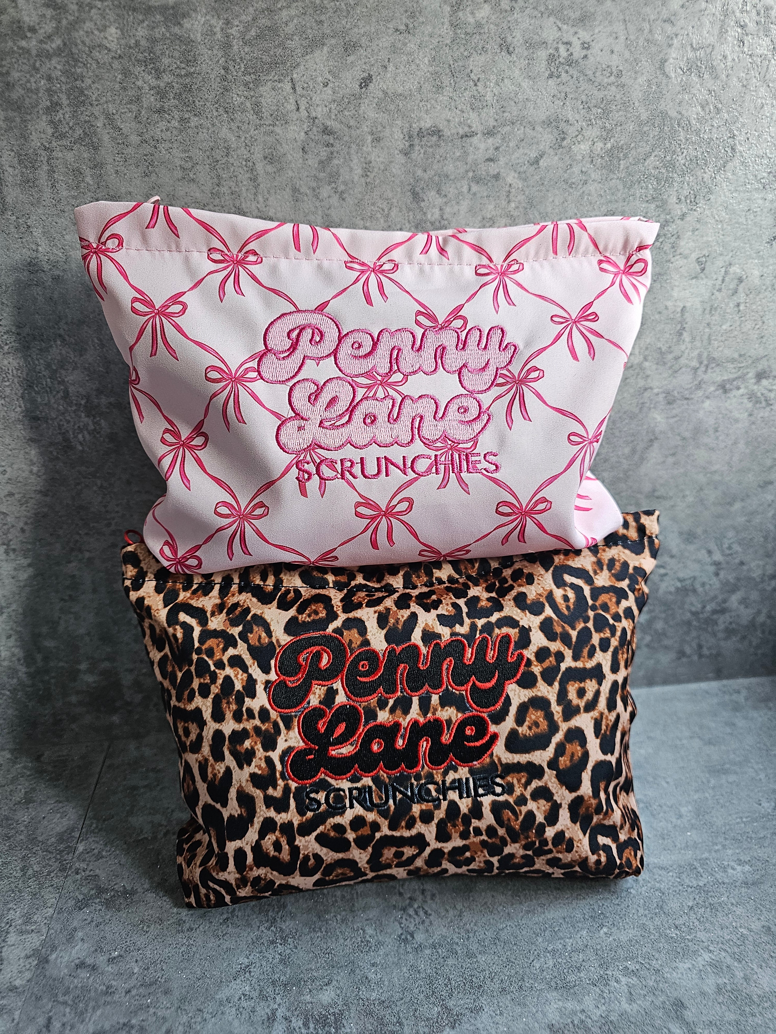 Embroidered zip pouches
