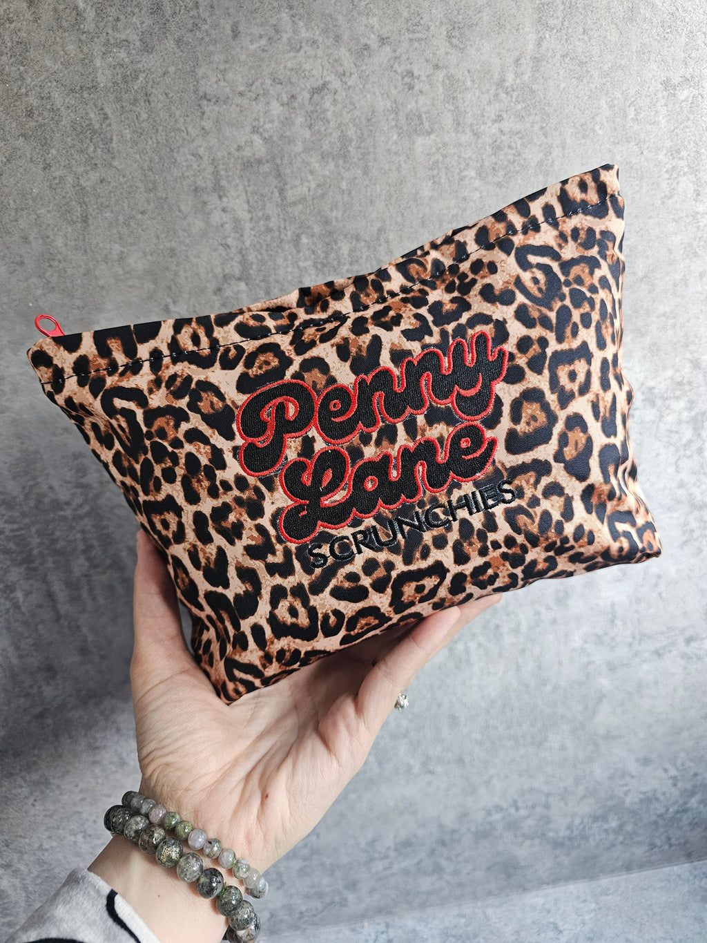 Embroidered zip pouches