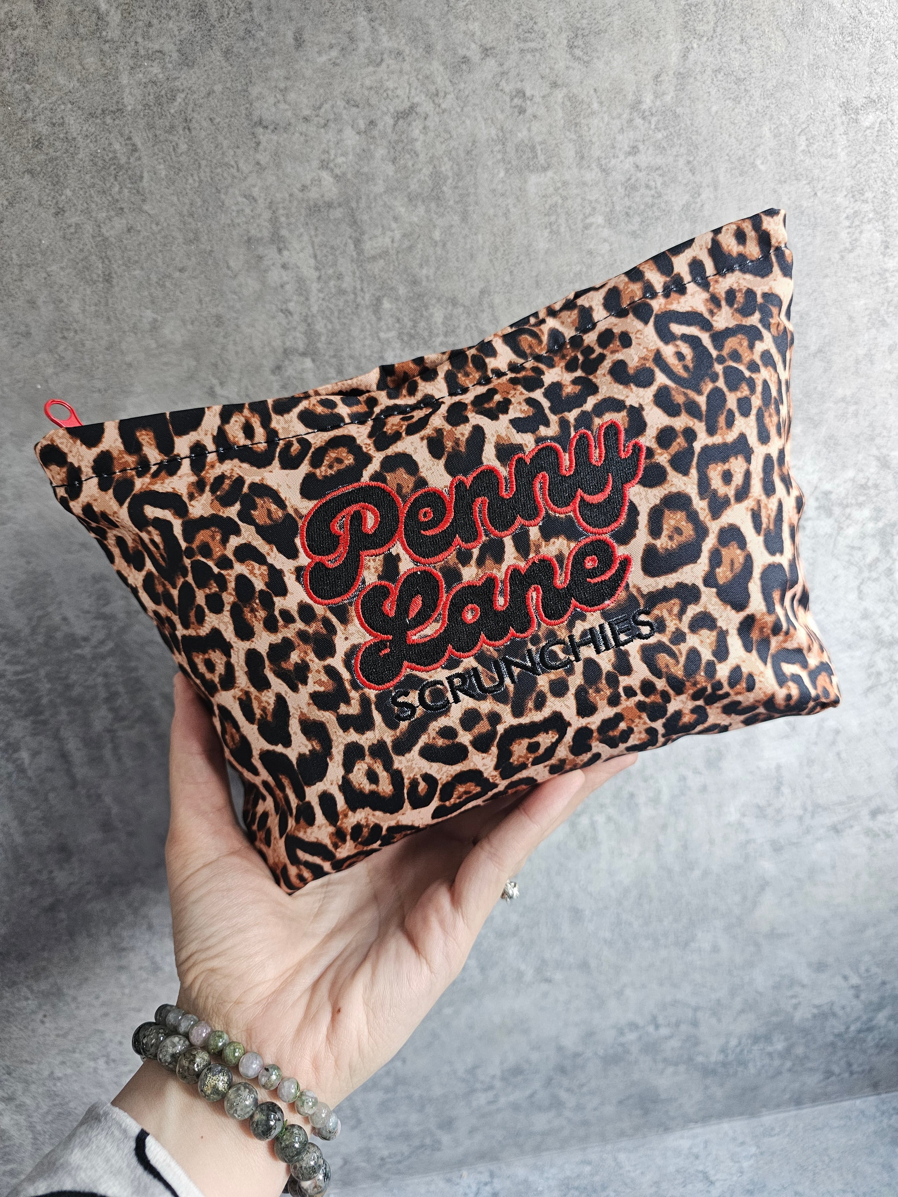 Embroidered zip pouches