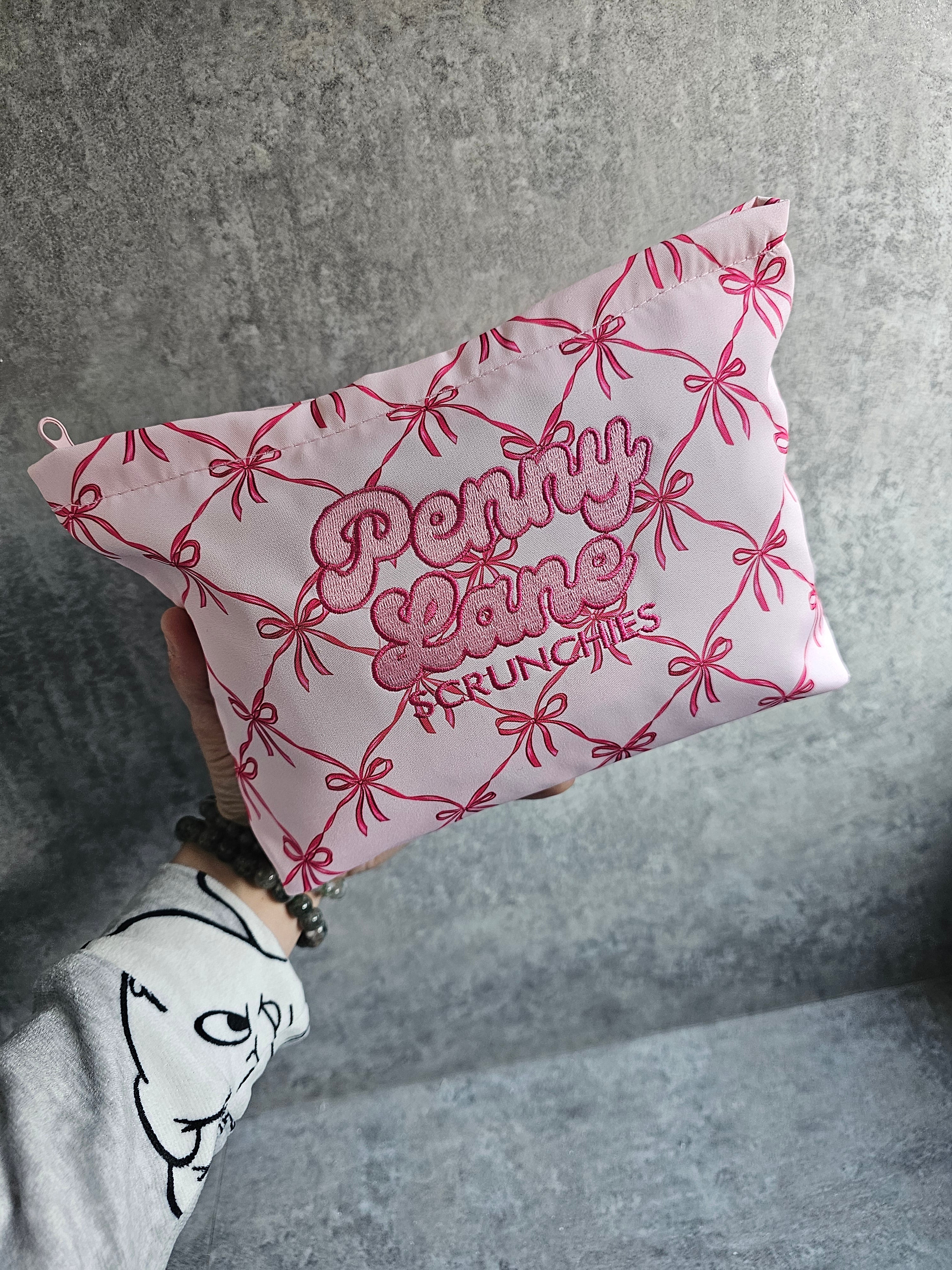 Embroidered zip pouches