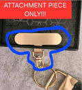 Phone attachment for keyrings and lanyards.