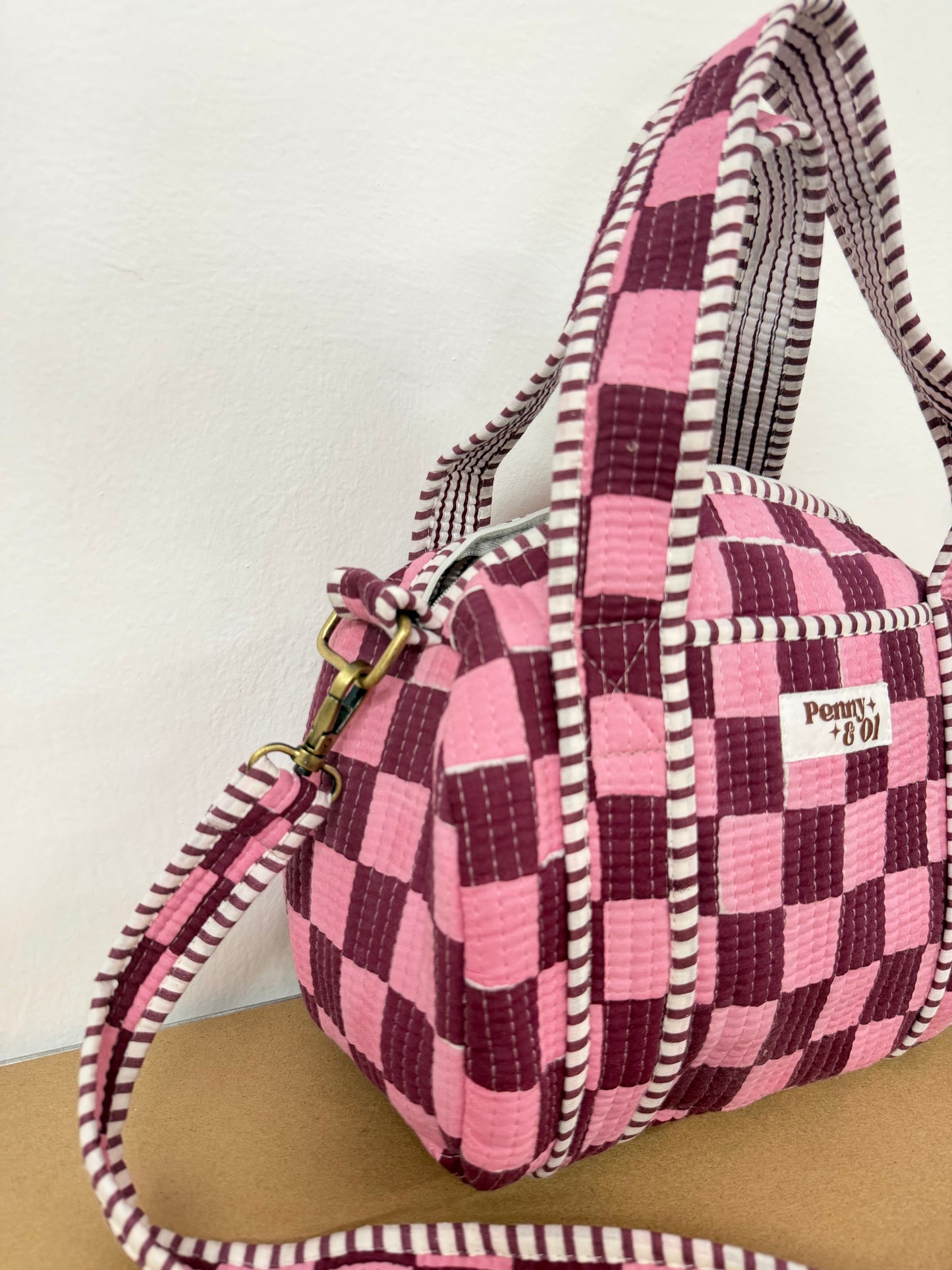Pink & burgundy checkerboard mini duffle bags