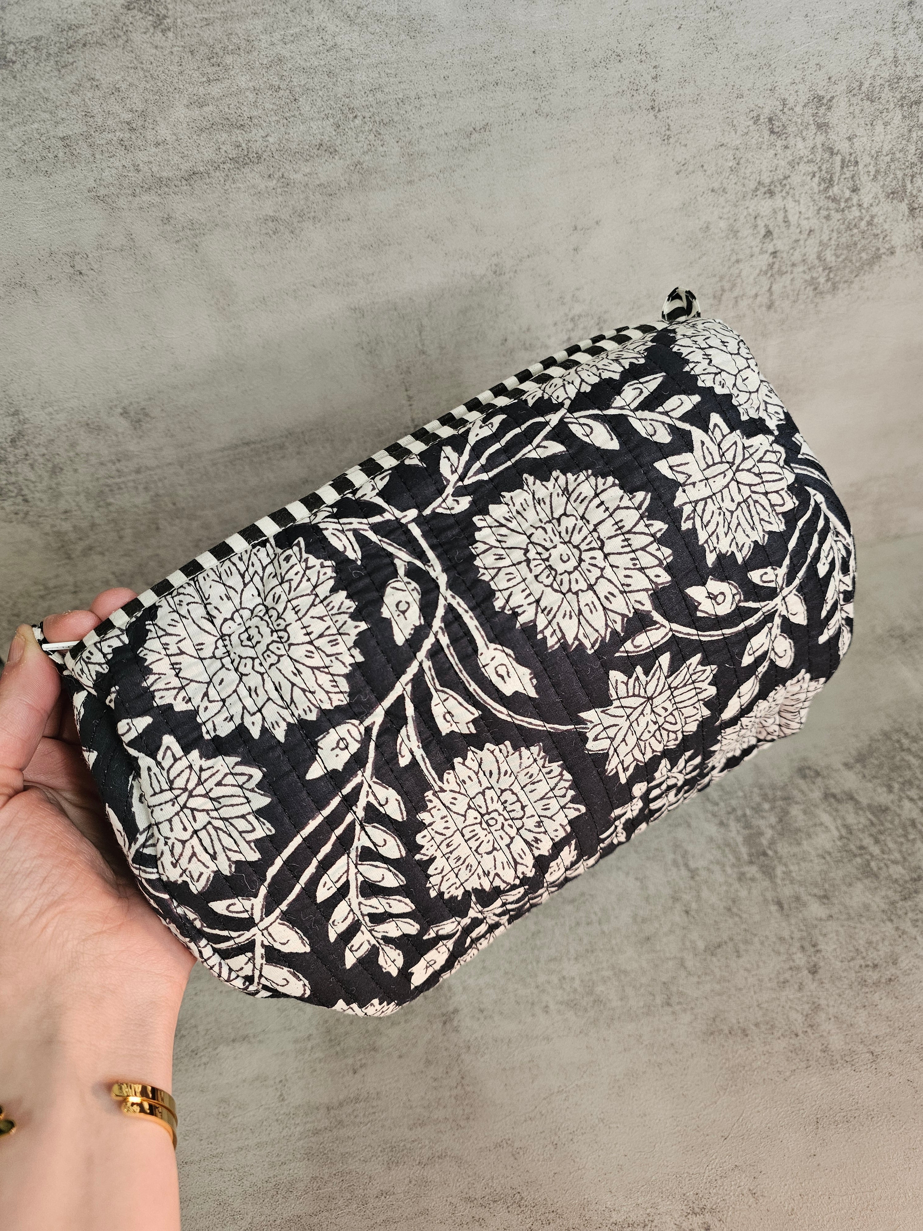 3 pack  waterproof pouches, all prints. 3 peice set
