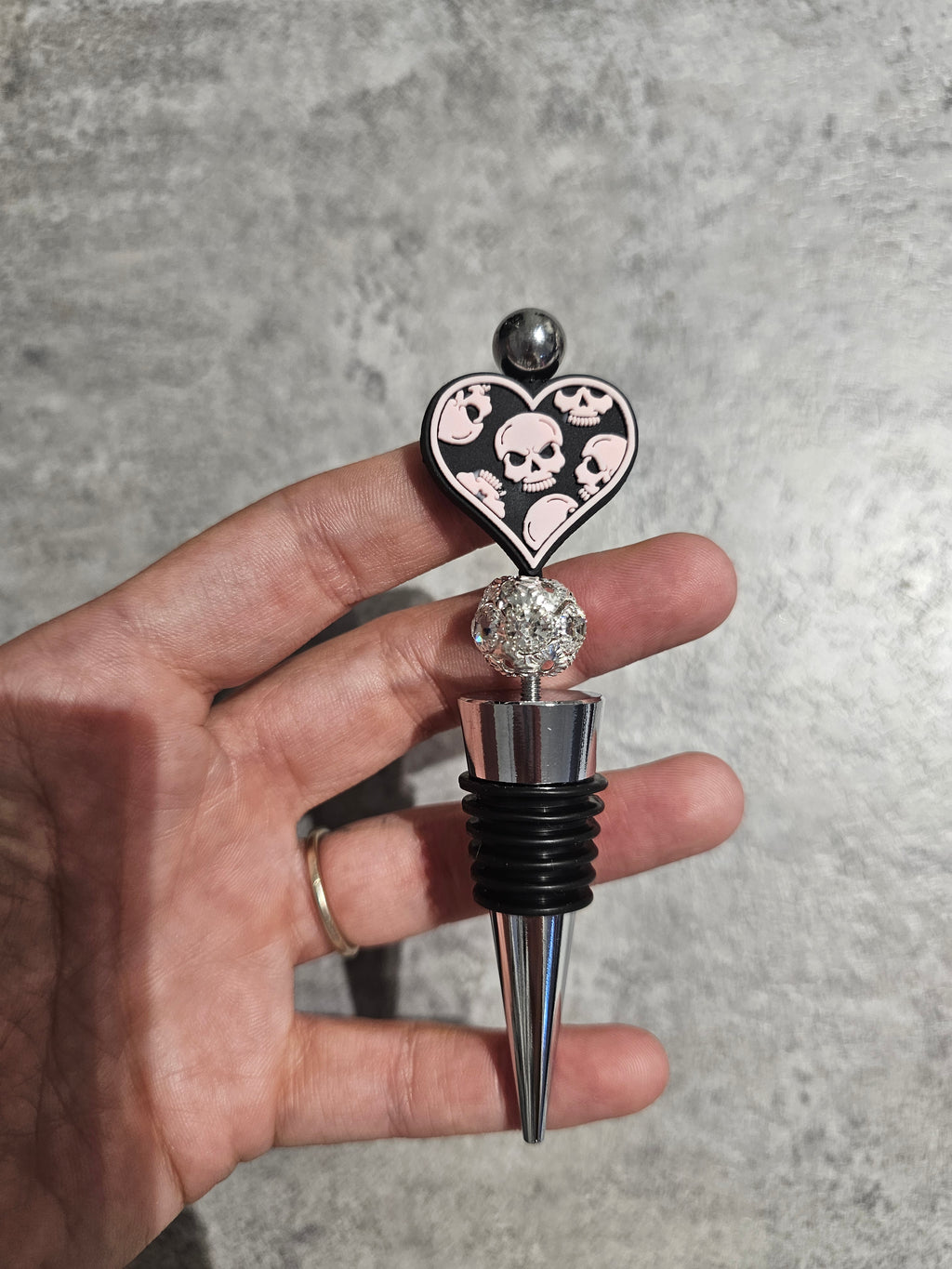 Beaded wine stopper. Only 1 of each available.