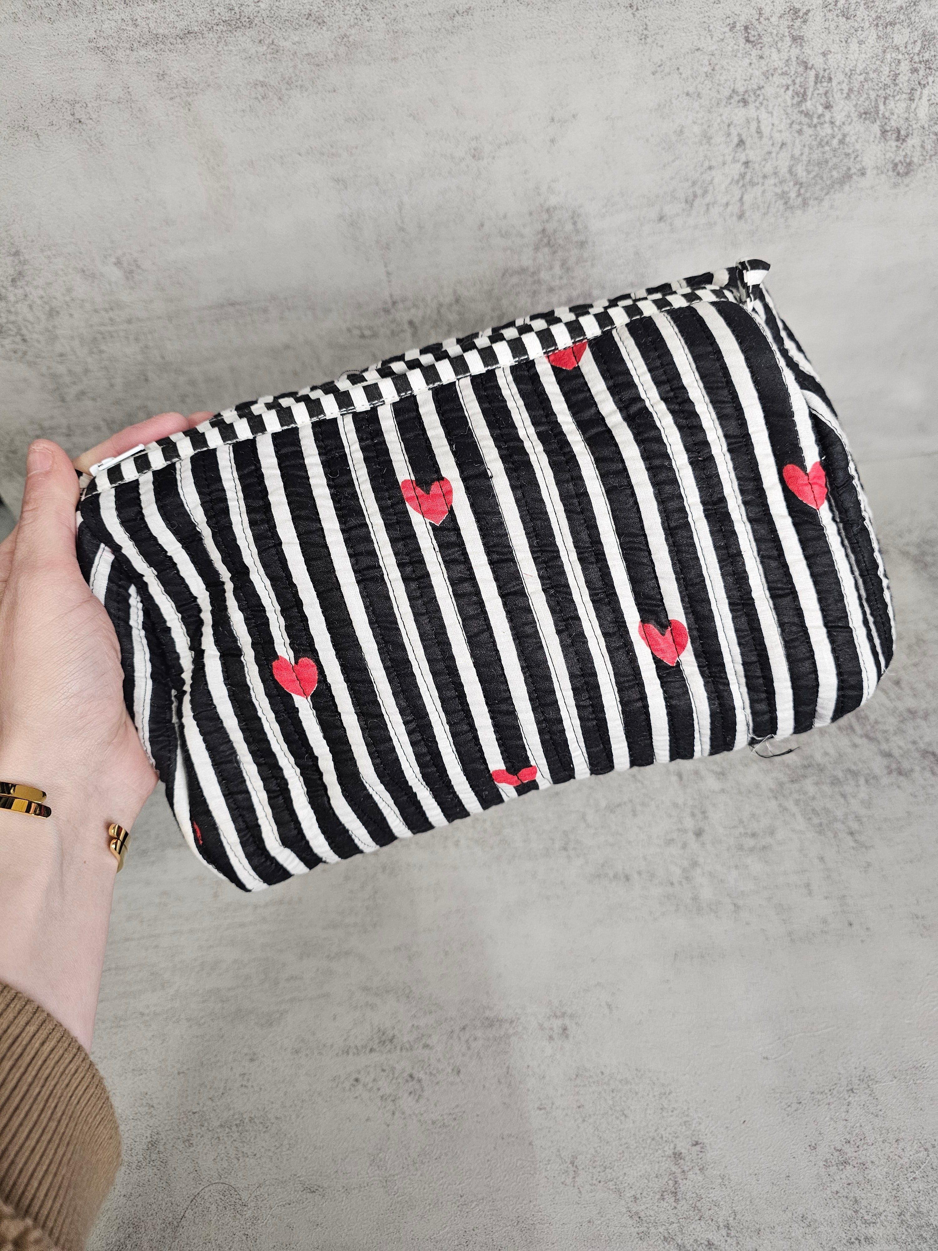 3 pack  waterproof pouches, all prints. 3 peice set