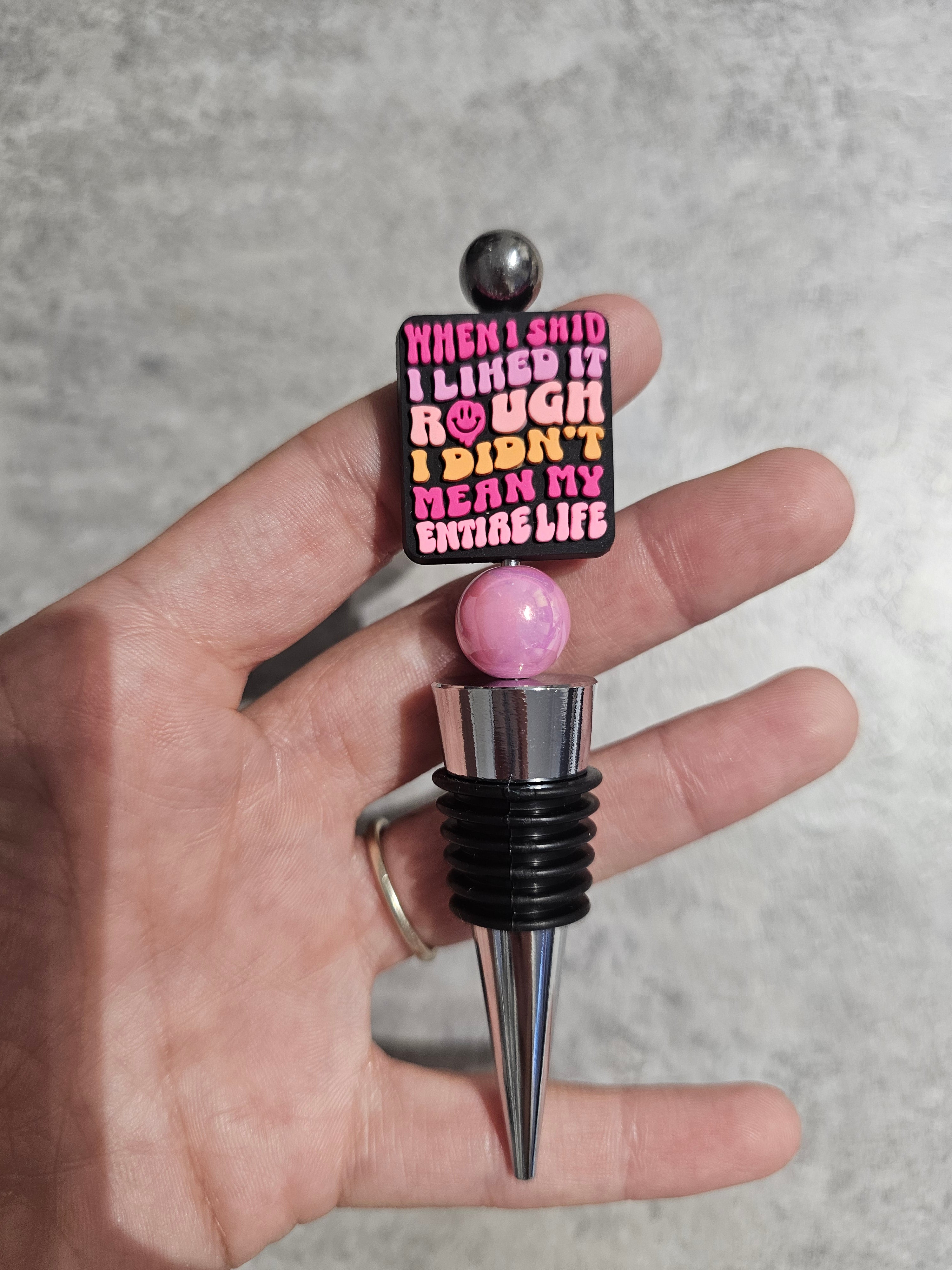 Beaded wine stopper. Only 1 of each available.