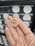 Brown with beige smiley shoe charm