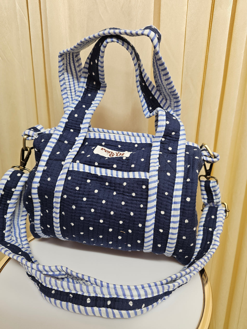 Navy polka dots mini duffle bags