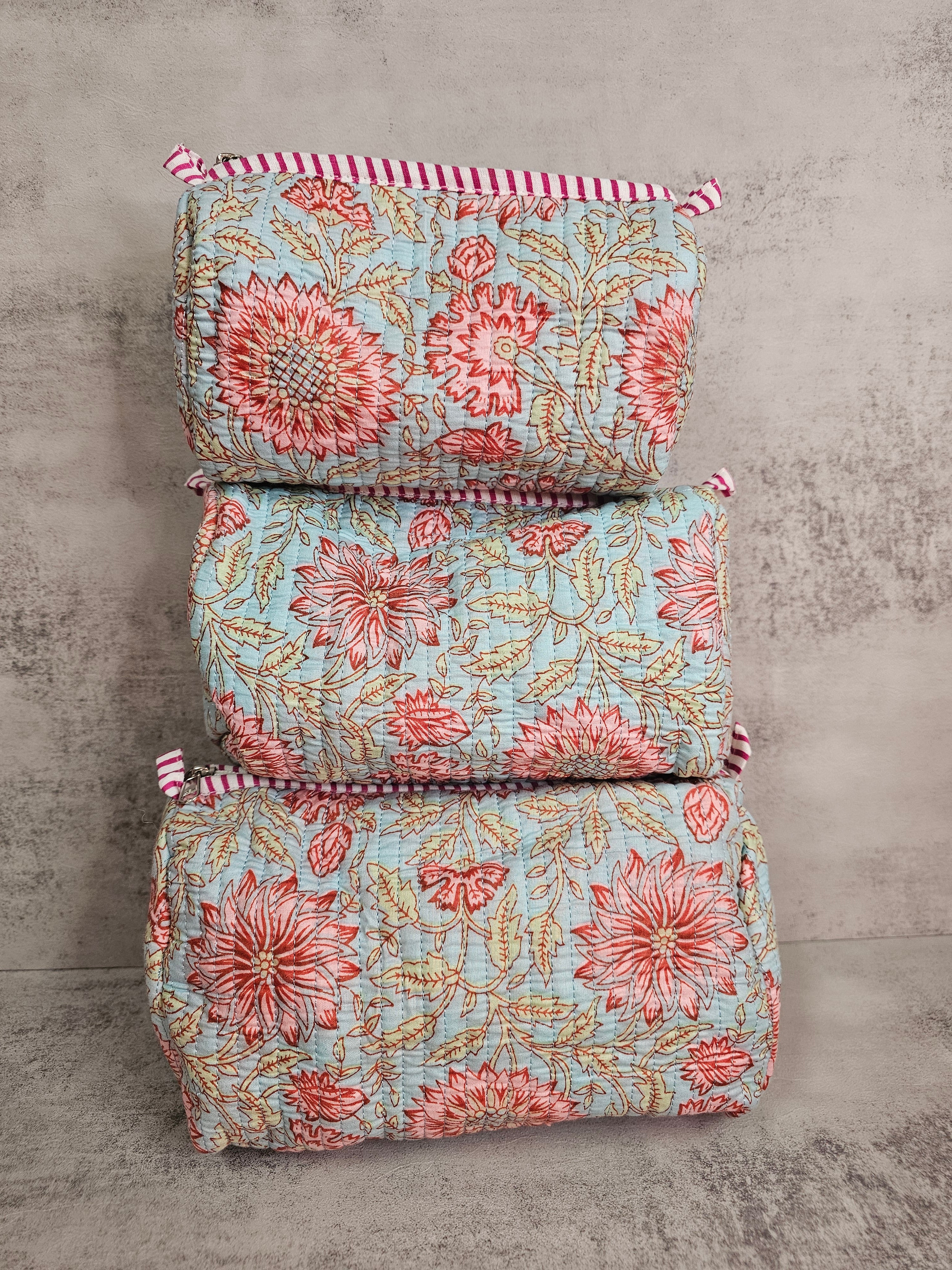 3 pack  waterproof pouches, all prints. 3 peice set