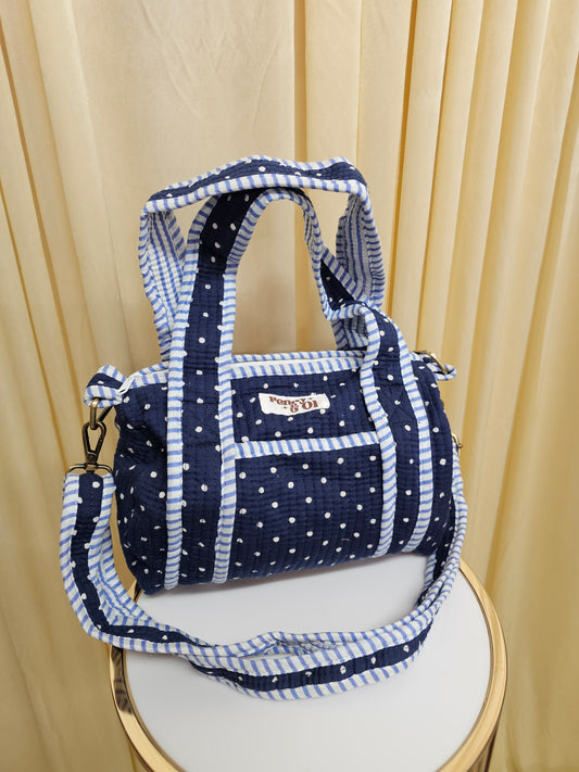 Navy polka dots mini duffle bags
