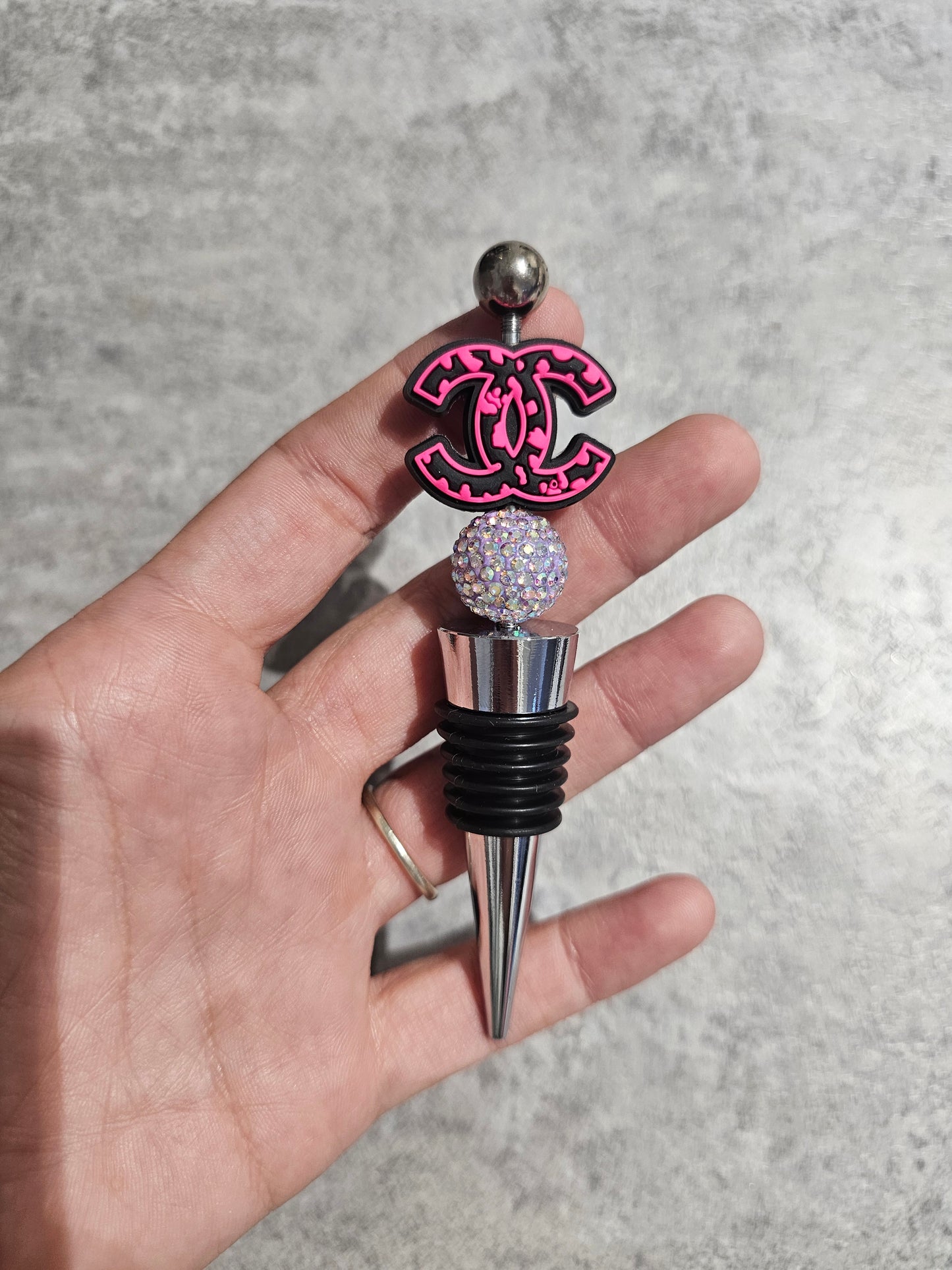 Beaded wine stopper. Only 1 of each available.
