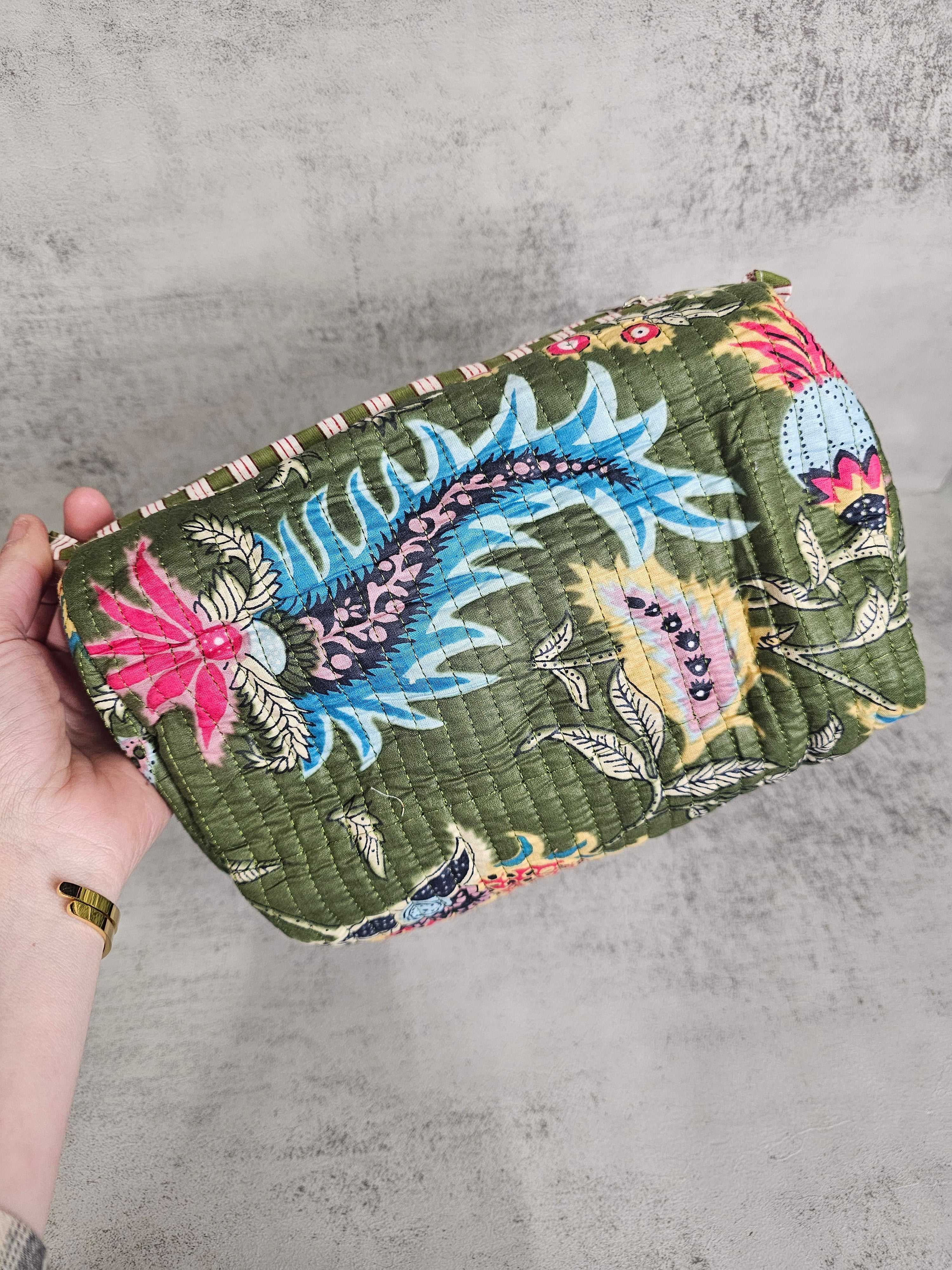 3 pack  waterproof pouches, all prints. 3 peice set