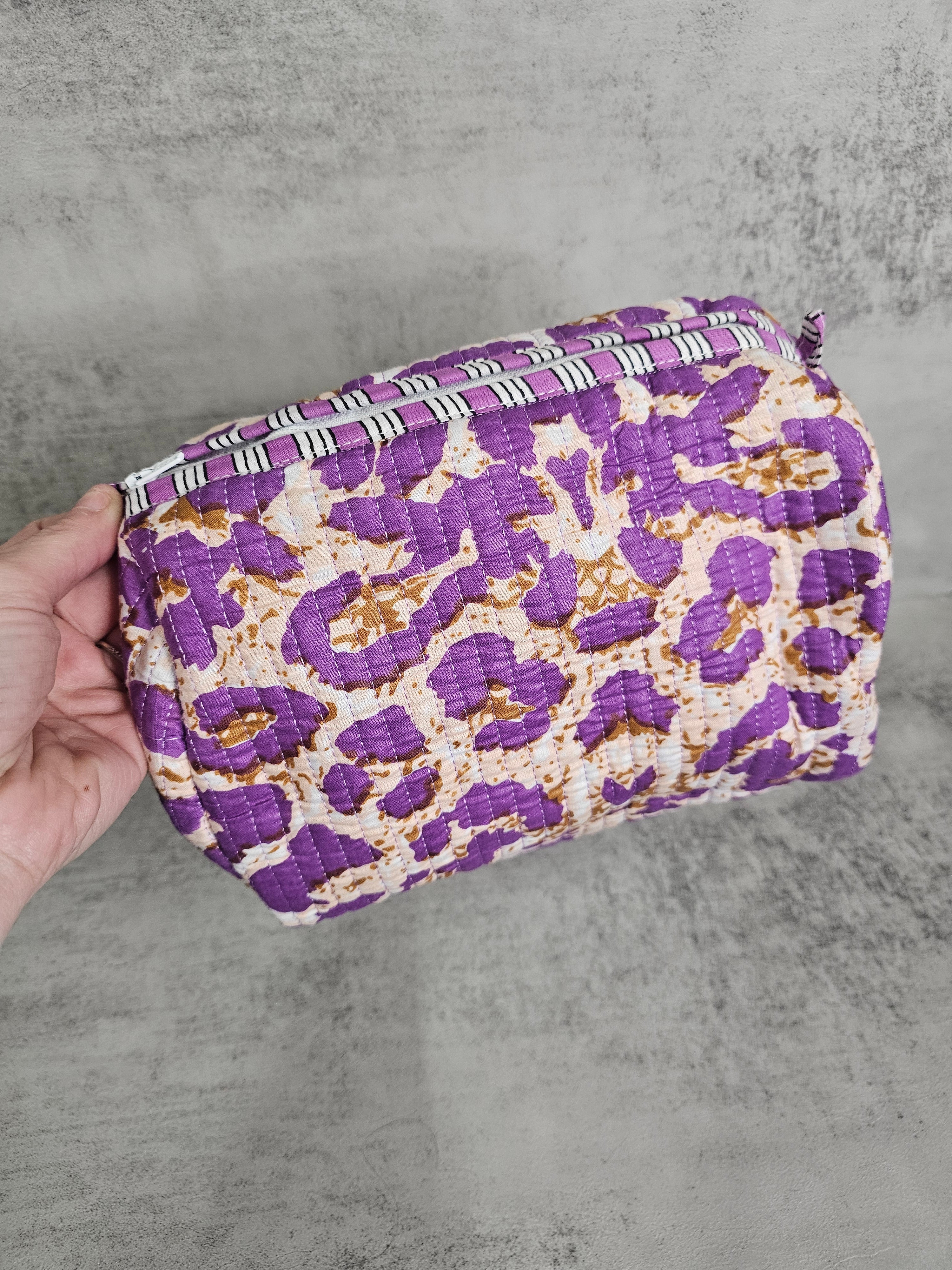 3 pack  waterproof pouches, all prints. 3 peice set