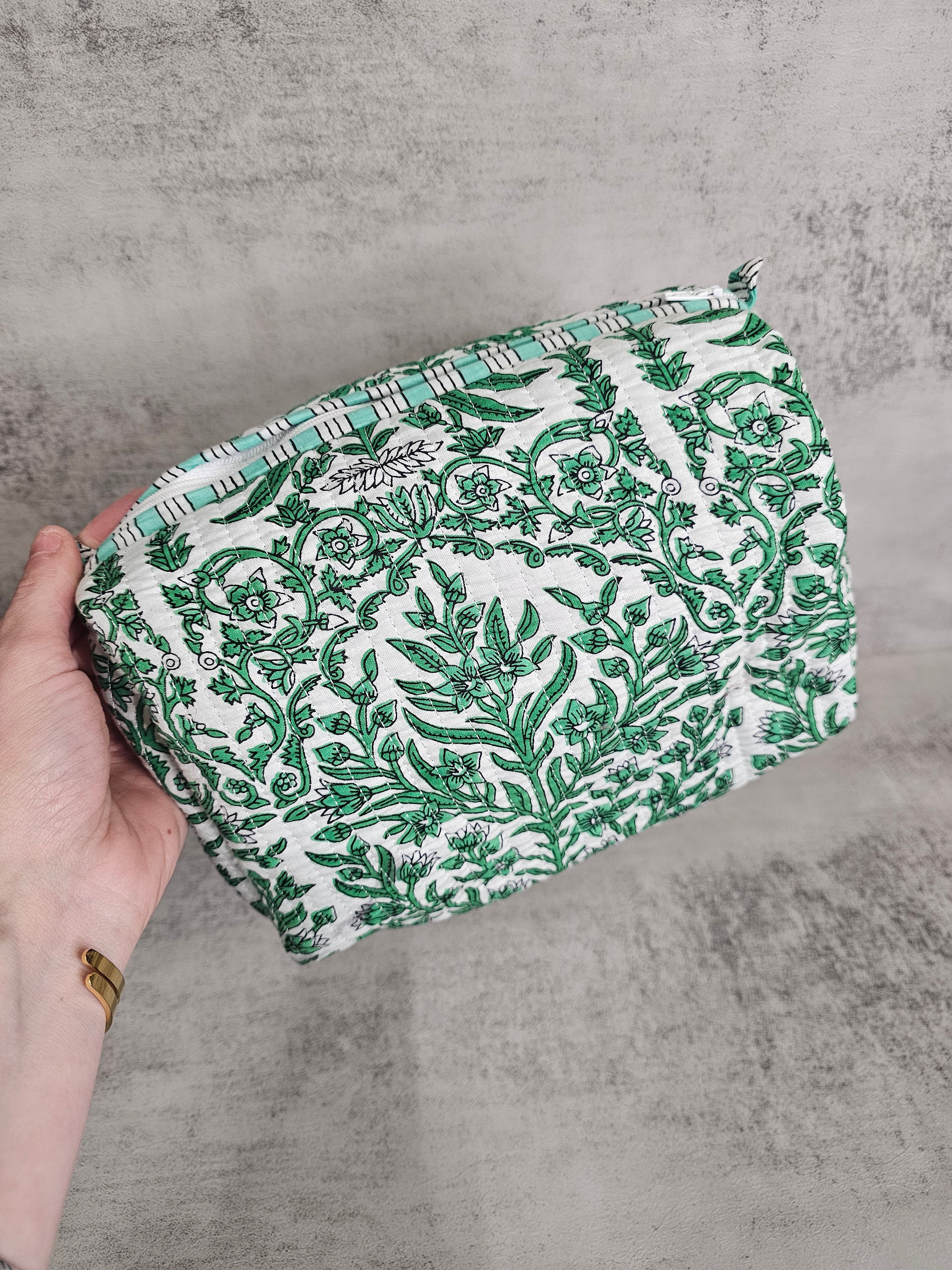 3 pack  waterproof pouches, all prints. 3 peice set