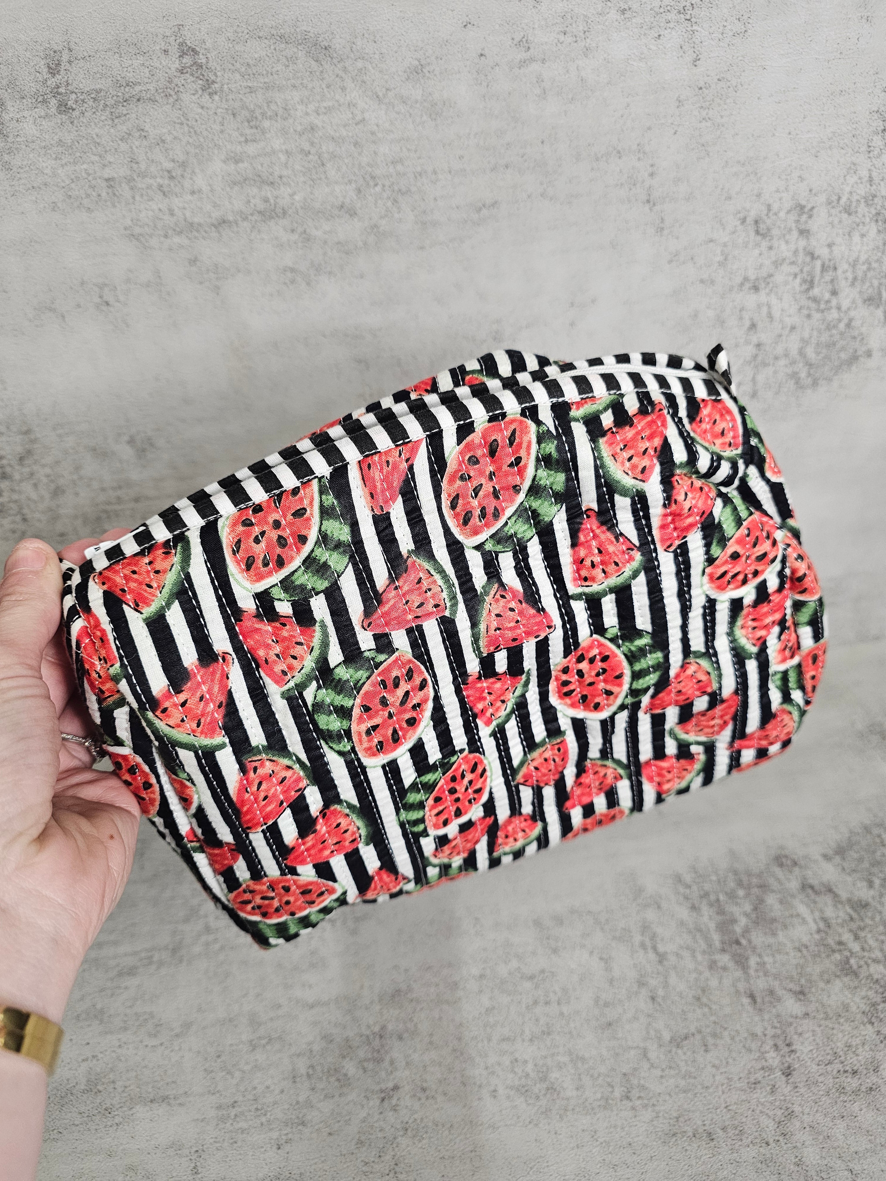 3 pack  waterproof pouches, all prints. 3 peice set