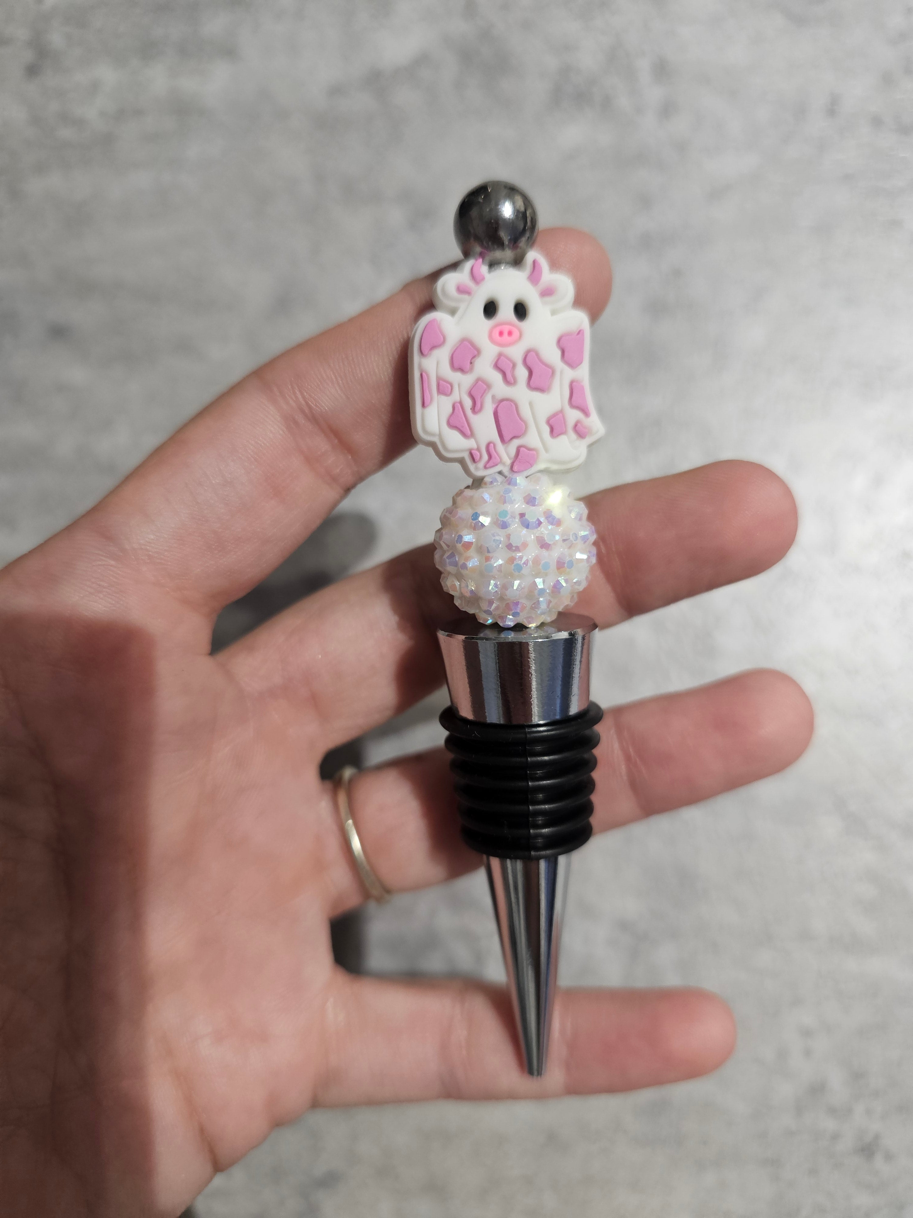 Beaded wine stopper. Only 1 of each available.