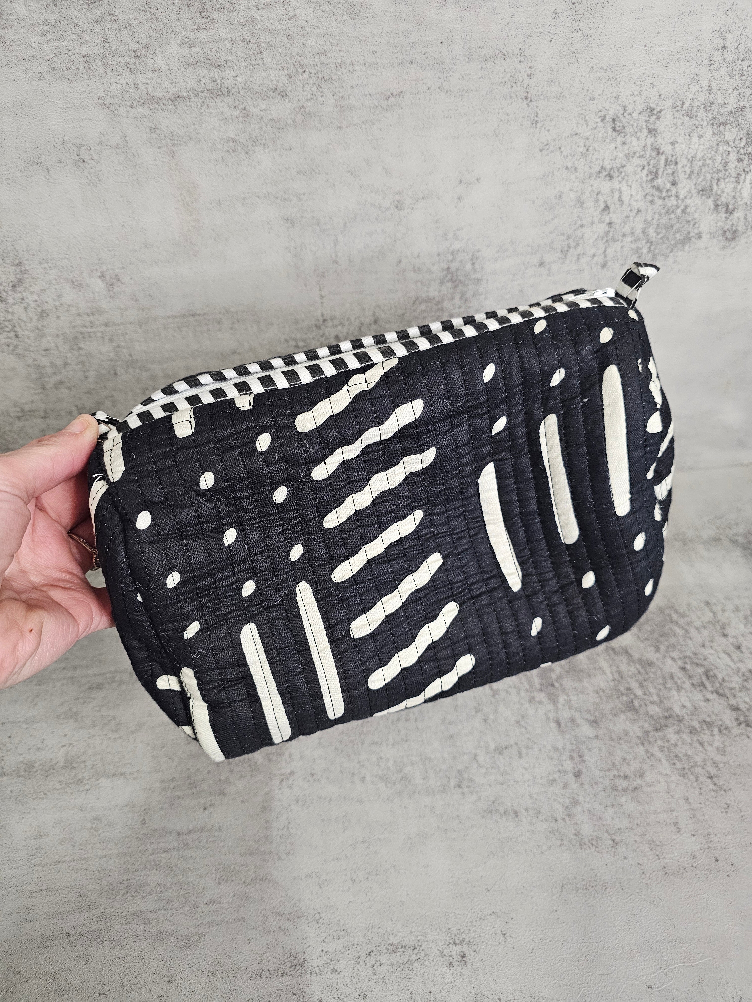3 pack  waterproof pouches, all prints. 3 peice set