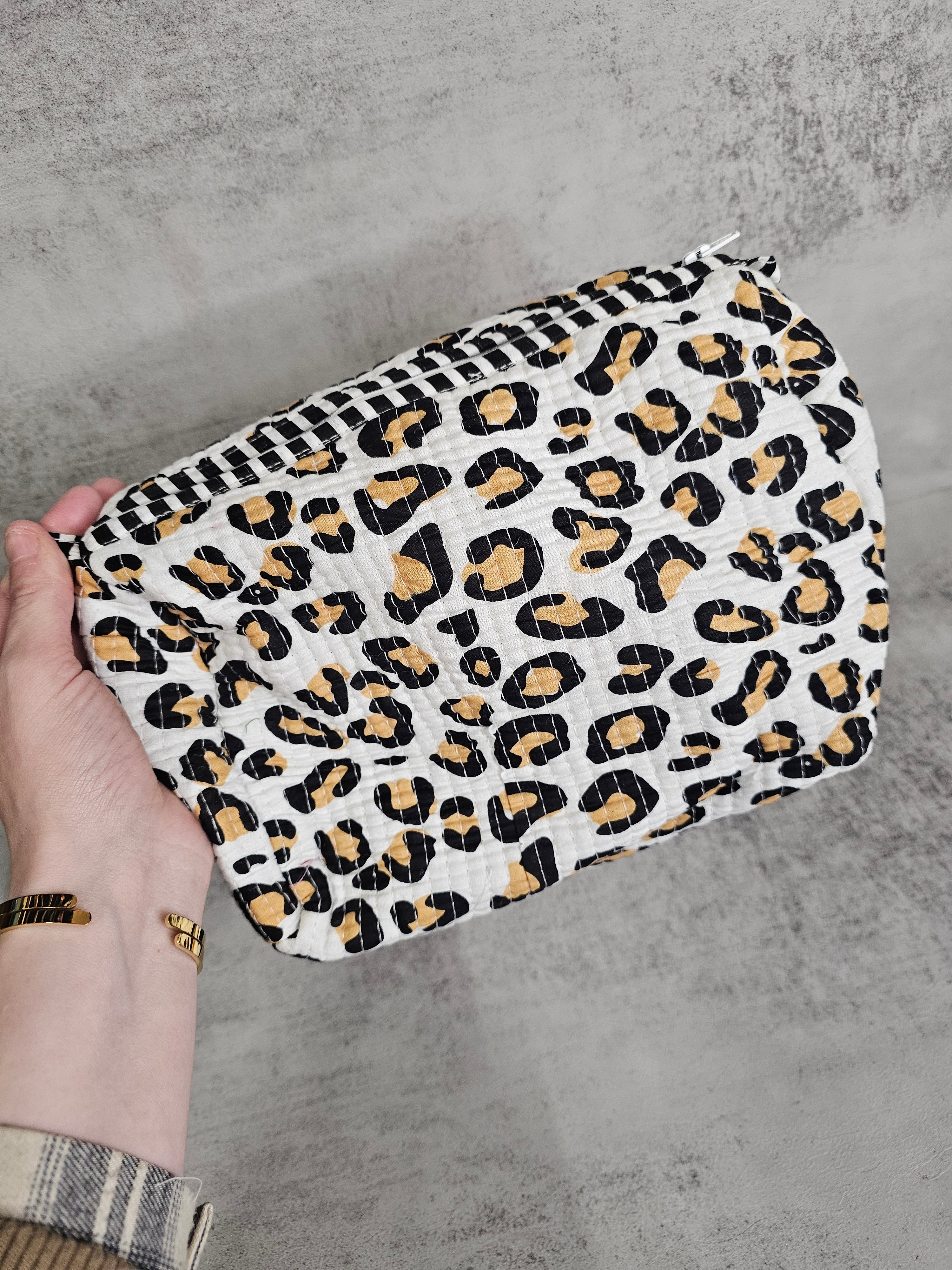 3 pack  waterproof pouches, all prints. 3 peice set