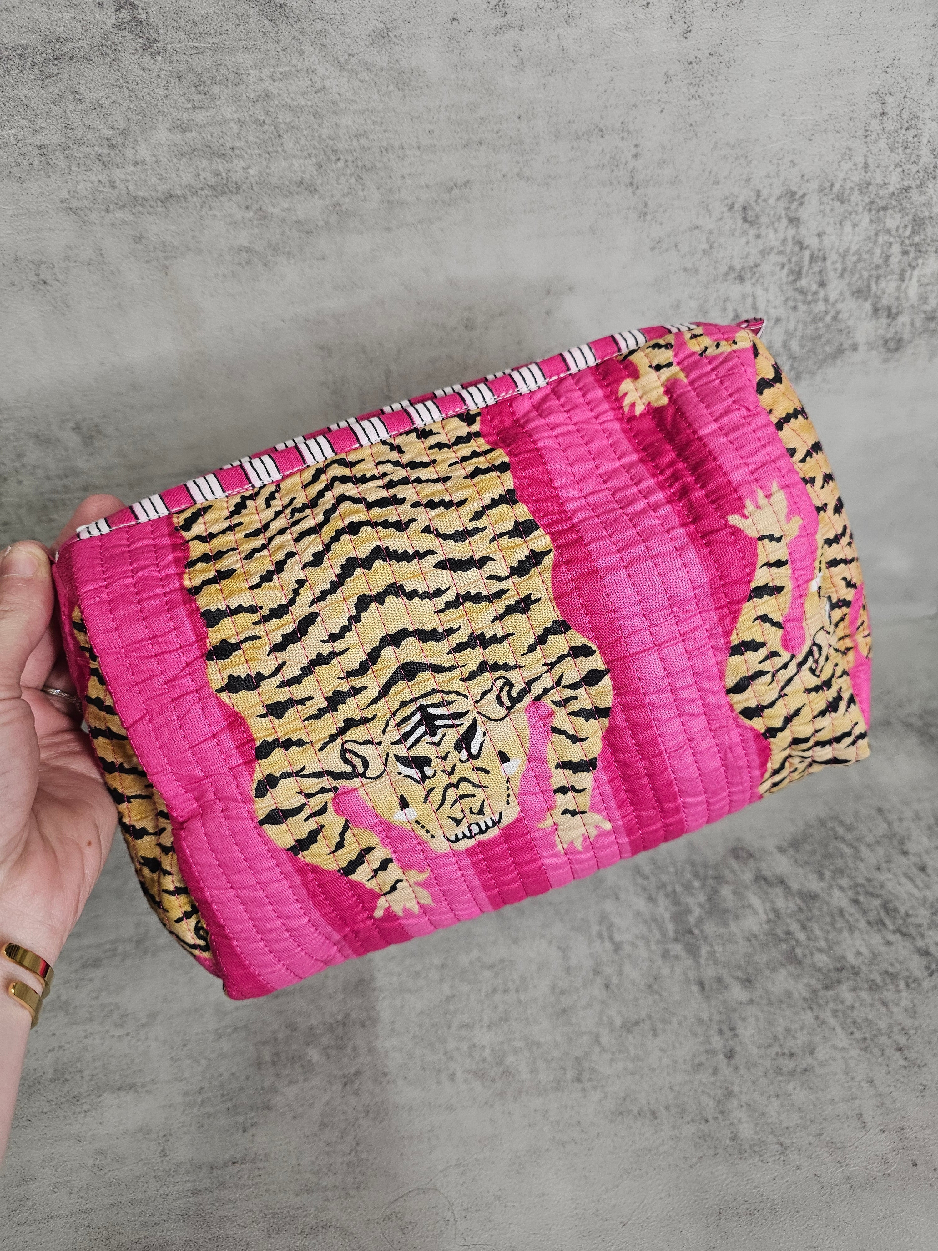 3 pack  waterproof pouches, all prints. 3 peice set