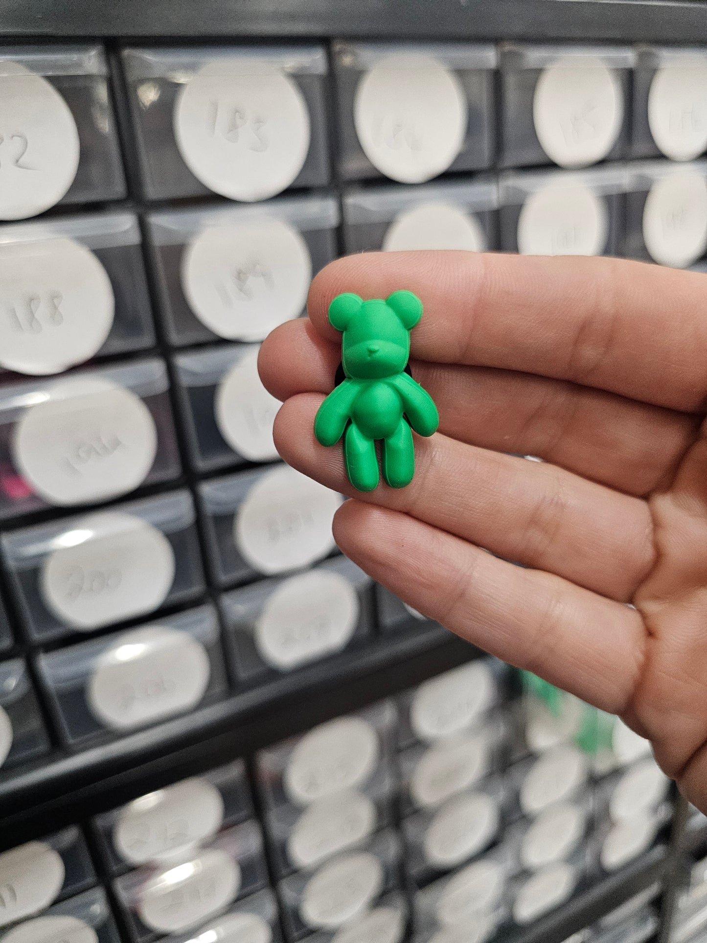 Small green teddy shoe charm